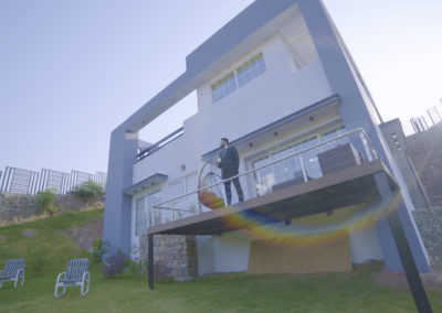 man standing on a balcony